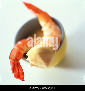 Shrimp dipped in mayonnaise, close-up Stock Photo
