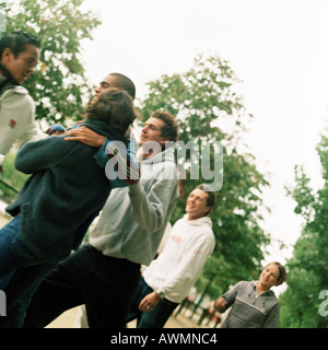 Group of young people in park Stock Photo