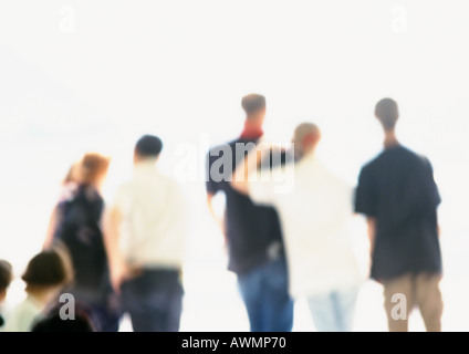 People standing side by side, rear view, blurred Stock Photo
