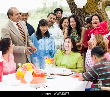 Hispanic family at birthday party Stock Photo