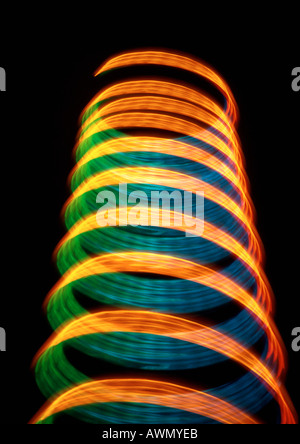 Cylindrical light effect, oranges, greens and blues. Stock Photo