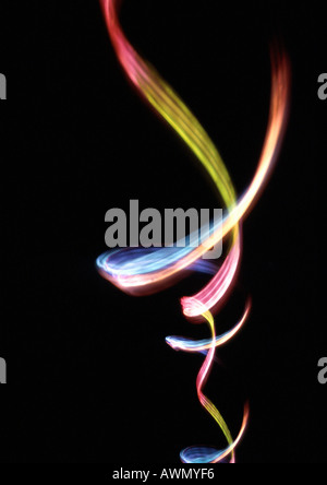 Light effect, multi-colored trail against black background Stock Photo