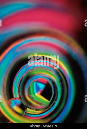 Spiraling light effect, rainbow colors. Stock Photo