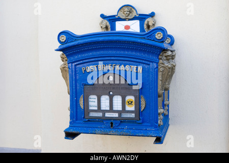 Antique blue mailbox, still in use Stock Photo