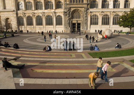 France Paris 1 Les Halles Esplanade in front of Saint Eustache church People enjoying sunny Sunday afternoon Stock Photo