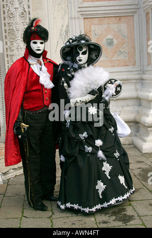 People wearing costumes and masks during Carnival in Venice, Italy, Europe Stock Photo