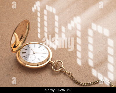 Pocket watch and digital time Stock Photo