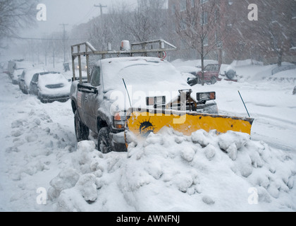 A scene along snow bound Montreal suburban street after a heavy snow fall. Stock Photo