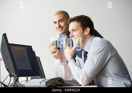 Businesspeople working together Stock Photo