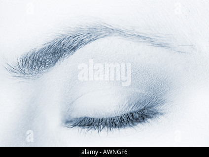 Woman's closed, made-up eye, close-up, b&w Stock Photo