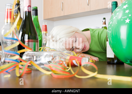 Woman sleeping after a party Stock Photo