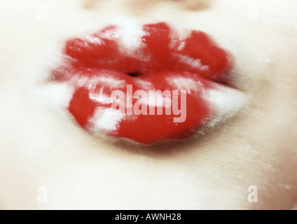 Woman's lips painted white and red, close up, blurred. Stock Photo