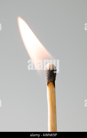 A burning match Stock Photo