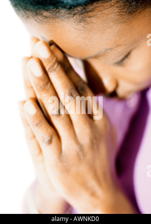 Woman with eyes closed, praying, close-up Stock Photo