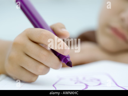 Child drawing with marker Stock Photo
