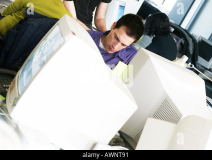 Man working at computer in office Stock Photo