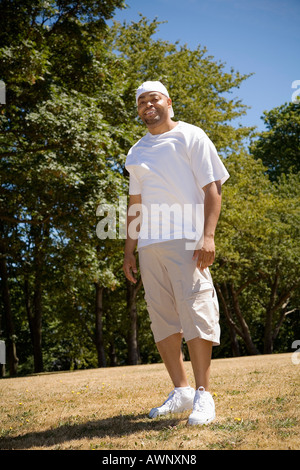 Man standing outdoors Stock Photo