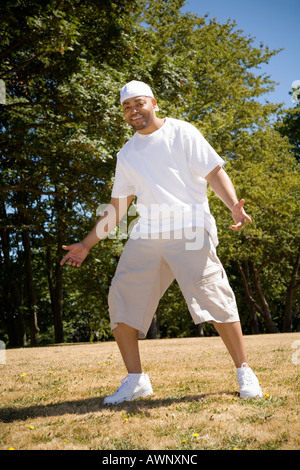 Man standing outdoors Stock Photo