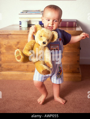 BABY BOY WITH TEDDY BEAR Stock Photo - Alamy