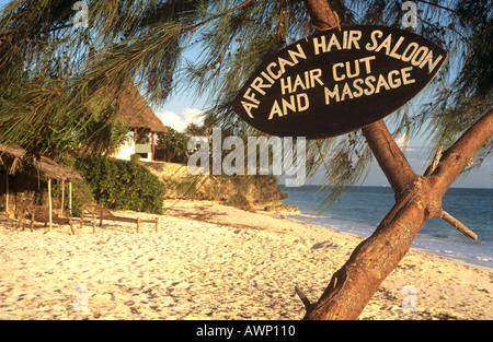 Local hairdressing sign on beach at Ras Nungwi in the north of Zanzibar Island, Tanzania Stock Photo