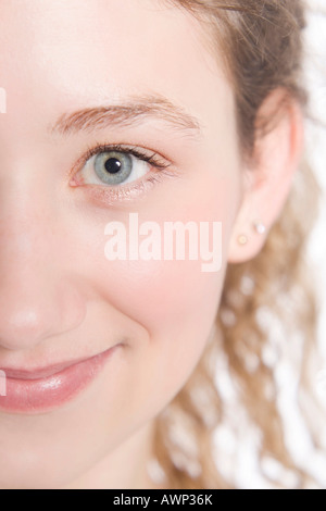 Detail shot of the right side of a woman's face, smiling Stock Photo