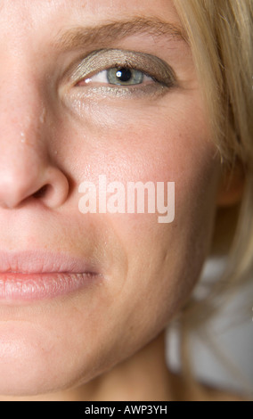 Young woman crying, tears streaming down her face Stock Photo