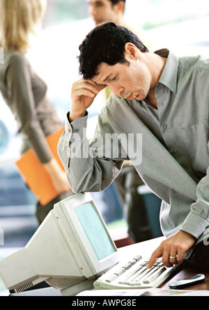 Businessman working on computer Stock Photo