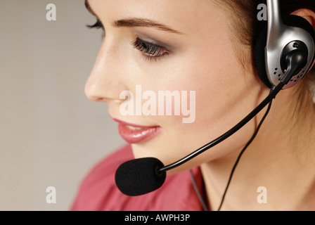 Young woman with headset Stock Photo