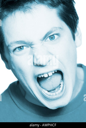 Teenage boy shouting, close-up, portrait Stock Photo