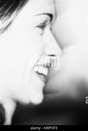 Woman smiling, side view, b&w Stock Photo