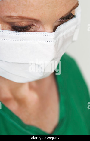 Nurse wearing surgical mask, surgical nurse, operating room nurse Stock Photo