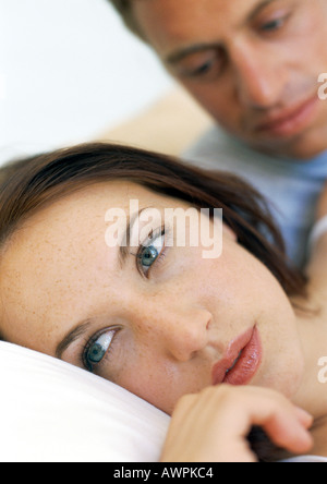 Couple in bed, close-up Stock Photo