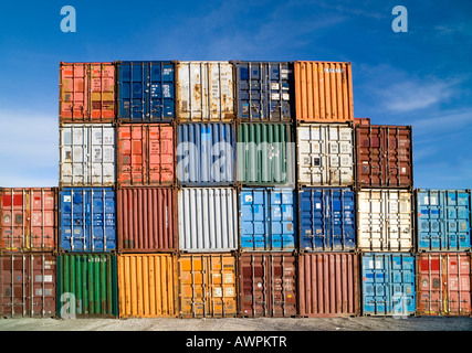 Various shipping containers, stacked Stock Photo