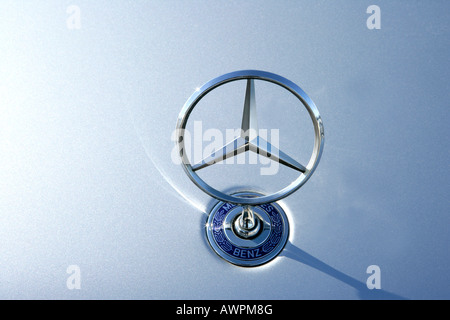 Mercedes logo on the hood of a car Stock Photo