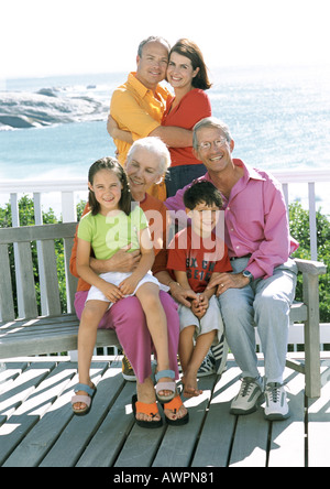 Family portrait in front of sea Stock Photo