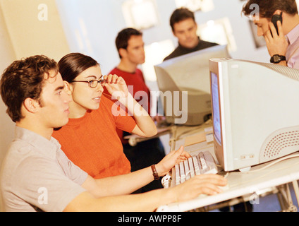 People working  on computers in office Stock Photo