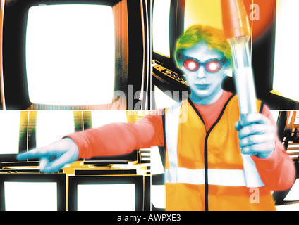 Young crossing guard standing in front of monitors, pointing, digital composite. Stock Photo