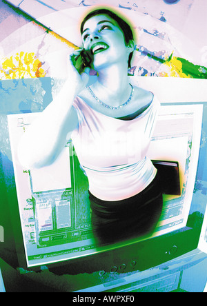 Young woman using cell phone, emerging from computer monitor, digital composite. Stock Photo