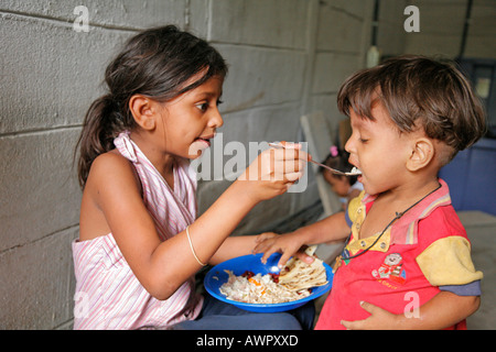 HONDURAS Children at a free feeding program The slum barrio of Chamelecon San Pedro Sula PHOTOGRAPHY by SEAN SPRAGUE 2006 Stock Photo