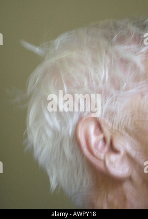 Senior man's ear, close-up. Stock Photo