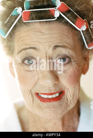Senior woman looking into camera, portrait. Stock Photo