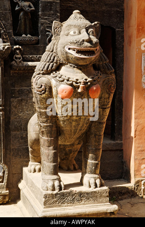 Lion statue, Golden Temple Kwa Bahal, Patan, Lalitpur, Kathmandu, Nepal Stock Photo