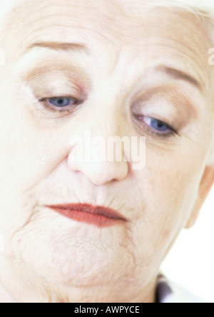 Elderly woman looking down, portrait, close-up Stock Photo