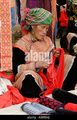 Woman of the Flower Hmong at Bac Ha market, Ha Giang Province, northern Vietnam Stock Photo