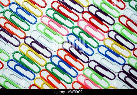 Coloured paper clips on a white background. Stock Photo