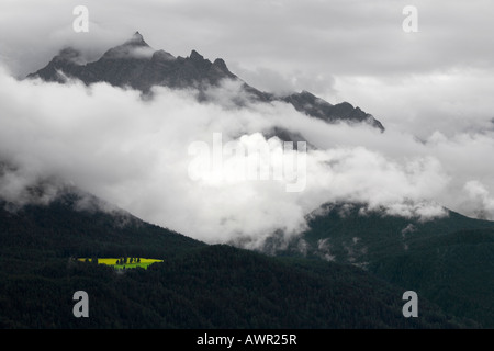 Cloudy mountain landscape, Sent, Lower Engadin, Graubuenden/Grisons, Switzerland, Europe Stock Photo