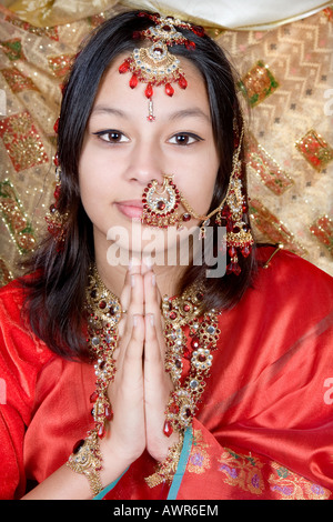 Attractive Indian lady greeting the Namaste greeting in saree Stock Photo