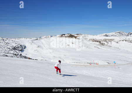 A broad view from the ski slope on to the popular Grandvalira skiing resort in the Pyrenees, Andorra (Spain) - snowboarding Stock Photo