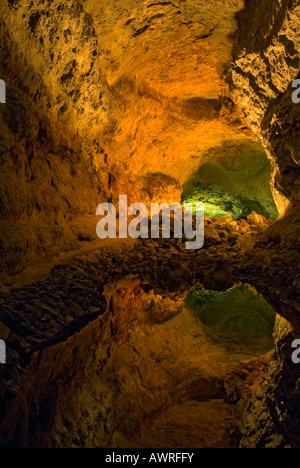 Cueva de Los Verdes, volcanic cave pool with perfect still reflection, Lanzarote Canary Islands Spain Stock Photo