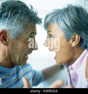 Mature couple having argument, side view Stock Photo